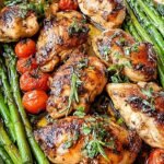 Golden pan-seared chicken breasts with green beans and cherry tomatoes in a balsamic glaze