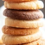 Freshly baked sugar-free chocolate chip cookies on a cooling rack