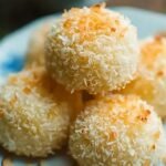Golden toasted Milky Coconut Biscuits on a cooling rack