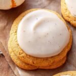 A tray of soft gluten-free pumpkin cookies with warm spices and a cake-like texture.