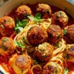 Golden brown air fryer turkey meatballs served in a white bowl