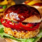 A juicy teriyaki chicken burger with a grilled pineapple ring on a toasted brioche bun