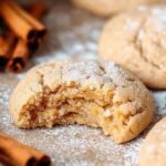 A tray of star-shaped gingerbread cookies without molasses on a cooling rack.