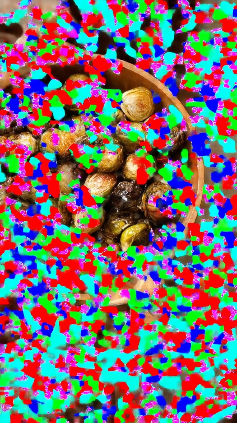 Golden brown roasted Brussels sprouts with a glossy balsamic maple glaze on a baking sheet