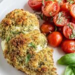Golden baked chicken breast topped with creamy green pesto goat cheese and crispy breadcrumbs