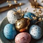 A collection of earthy, naturally dyed Easter eggs with botanical leaf imprints sitting in a wooden bowl.