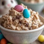 A bowl of pastel Easter Muddy Buddies with white chocolate and sprinkles