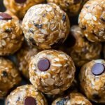 A plate of round chocolate chip energy balls with oats and coconut