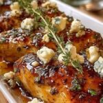 Pan-seared chicken breasts topped with melted feta cheese and a spicy red pepper honey glaze