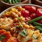 Four glass meal prep containers filled with roasted chicken, sweet potatoes, Brussels sprouts, quinoa, and kale.