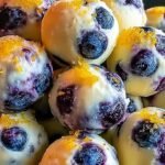 A plate of lemon blueberry protein bites made with cottage cheese and oats.